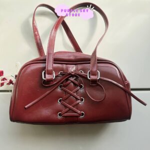 حقيبة كرزية جلد